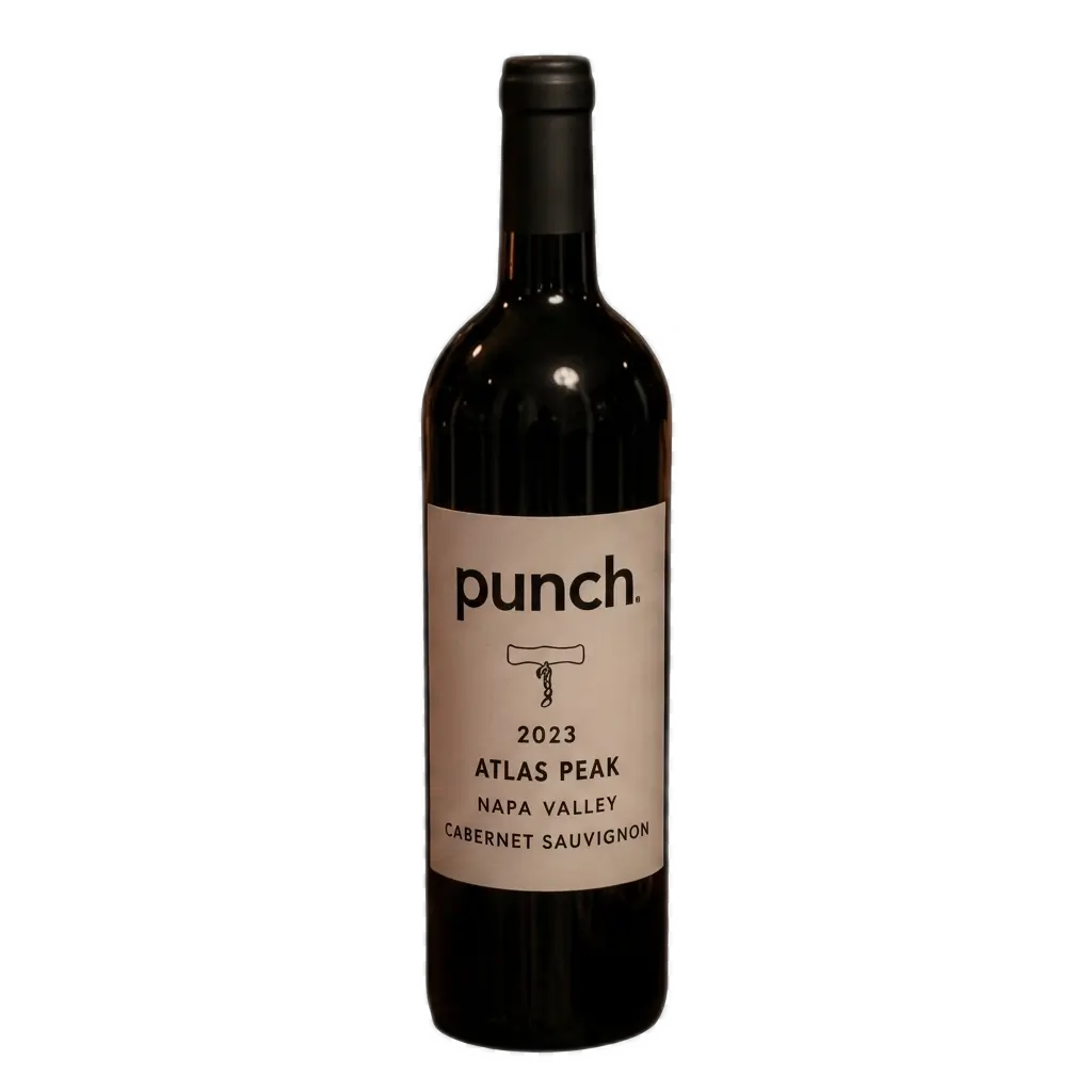 A isolated 2023 Punch Atlas Peak Napa Valley Cabernet Sauvignon wine bottle with a dark glass body and light cream label, centered against a transparent background.